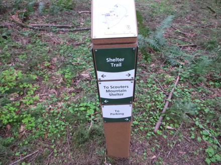 Example of trail signage capped with trail map indicating location